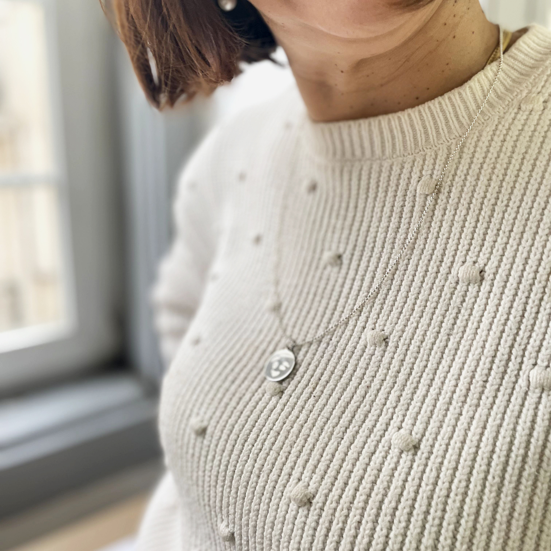 medalha em modelo Winking smile em prata da Leitão & Irmão