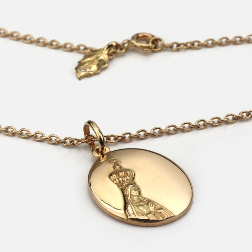 Medalha e fio com imagem de Nossa Senhora de Fátima com fio em ouro novo milénio da leitão & Irmão